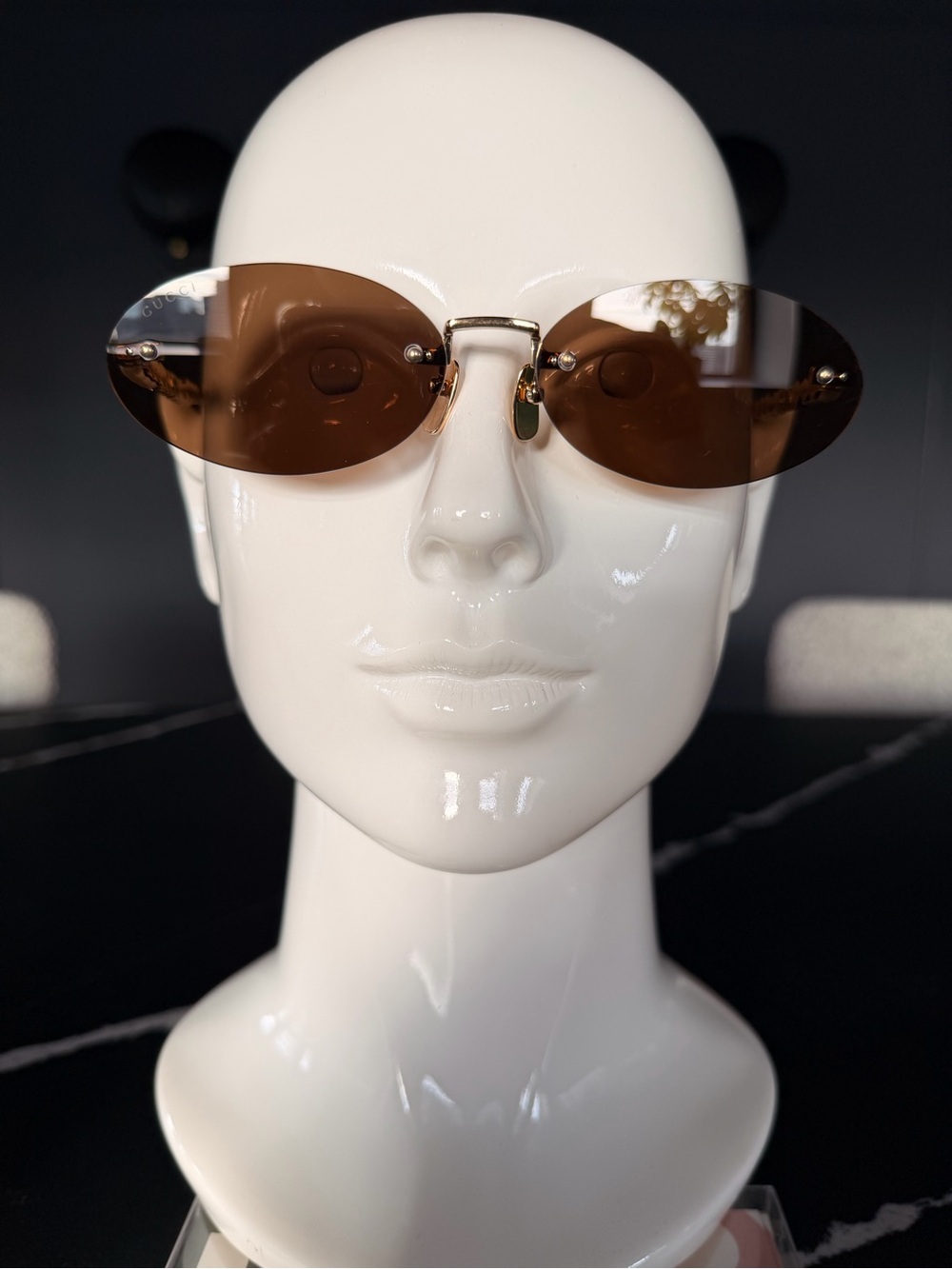 Gucci Rimless Oval Sunglasses in Brown with Gold Bridge
